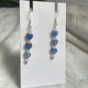 Blue heart dangle earrings with light catching accent beads. 925 silver hooks